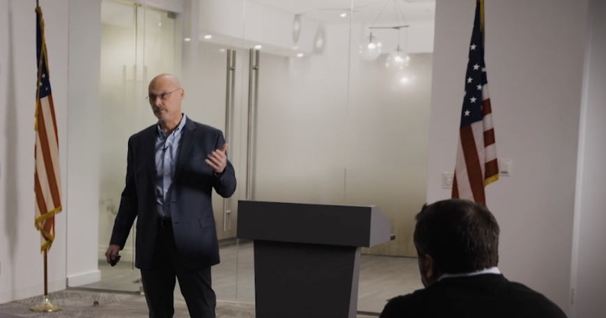 Dan Beatty speaking to construction leaders in a live program